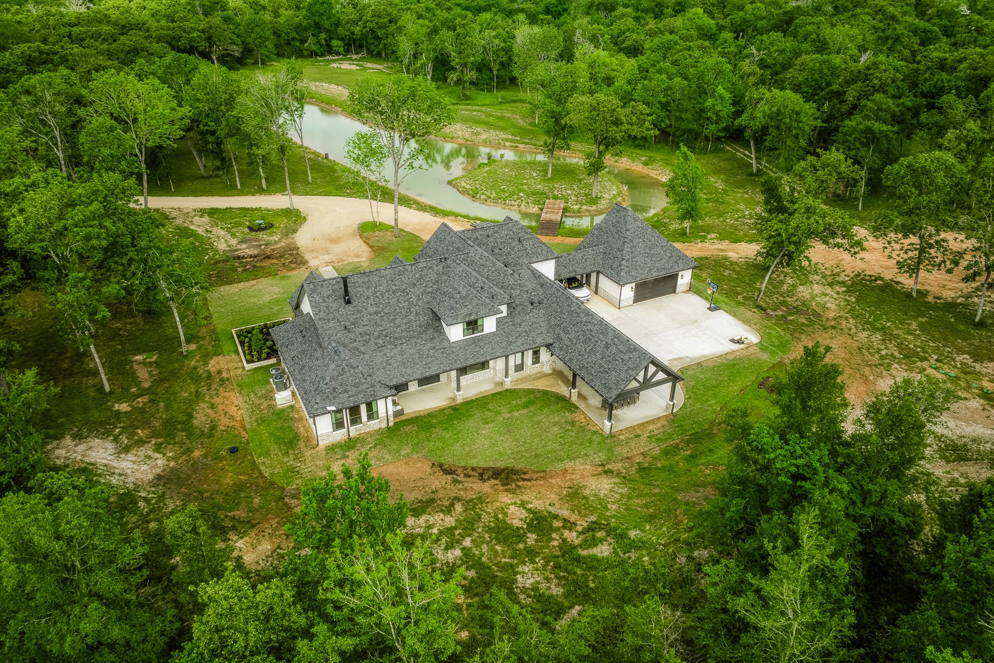 40051 Mesquite Hempstead, TX 77445 - Photo 6 of 29 an aerial view of a house with a yard basket ball court and outdoor seating