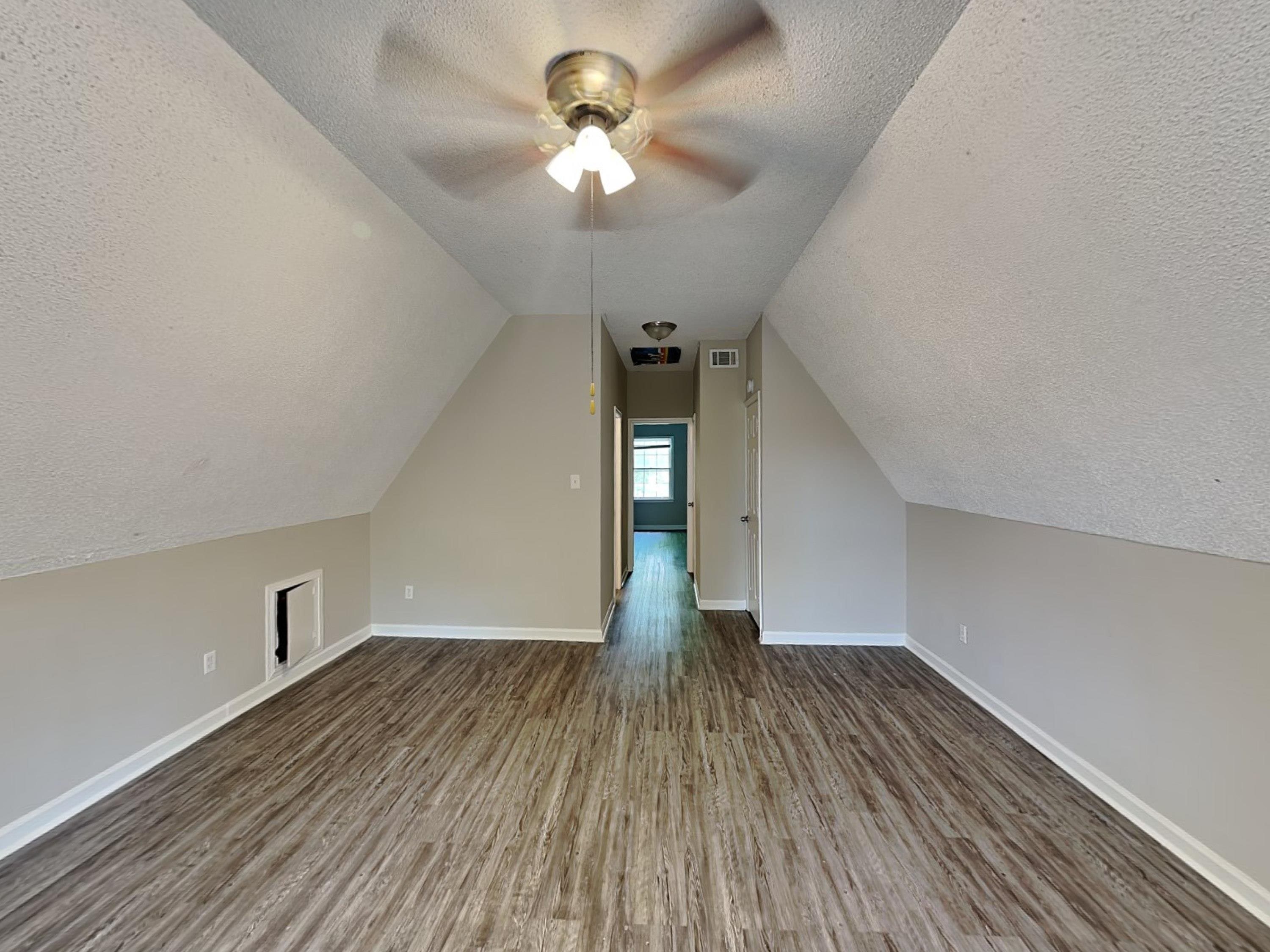 7041 Cutter Mill Road Memphis, TN 38141 - Photo 12 of 18 a view of empty room with wooden floor
