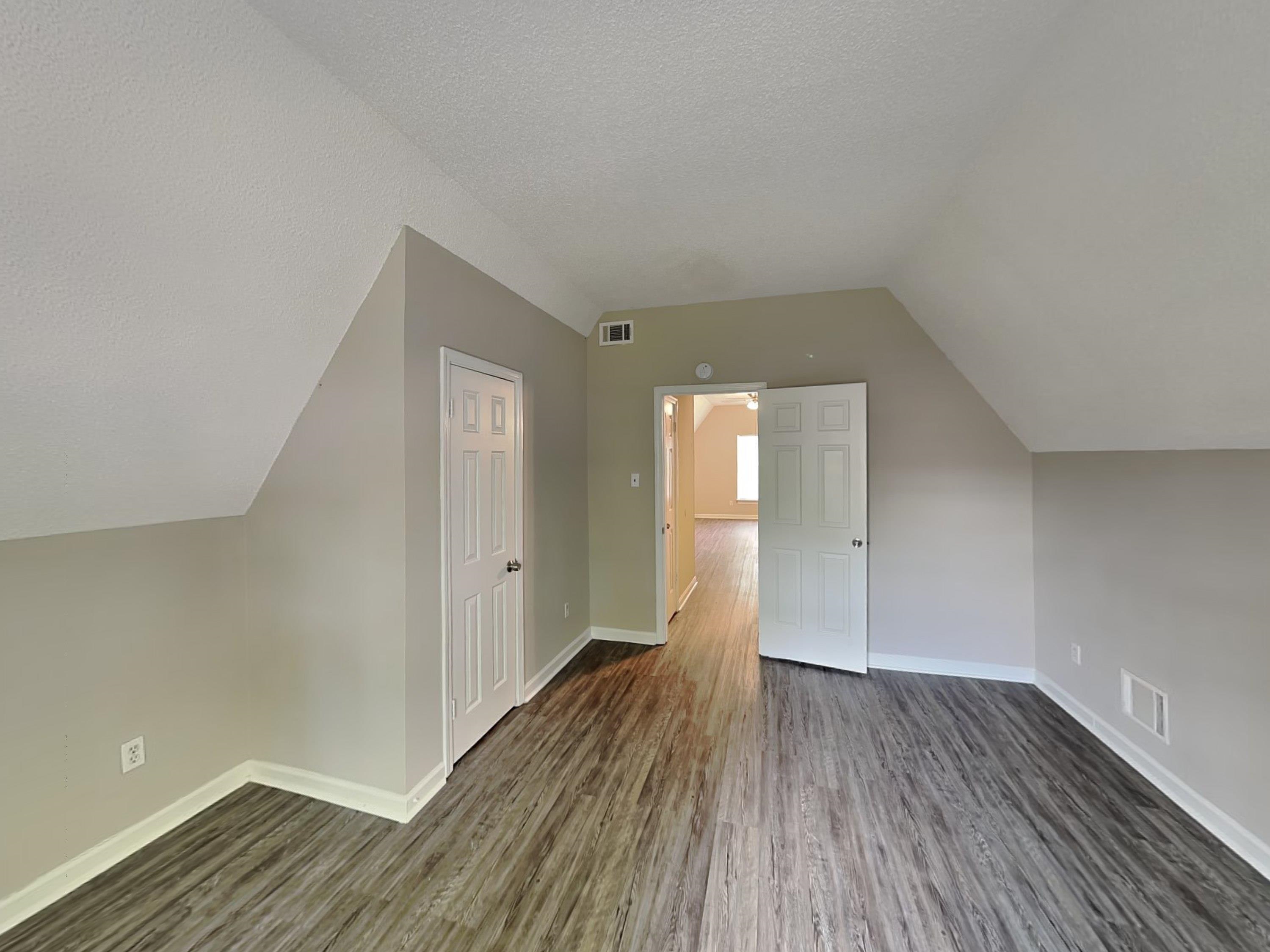 7041 Cutter Mill Road Memphis, TN 38141 - Photo 13 of 18 a view of empty room with wooden floor