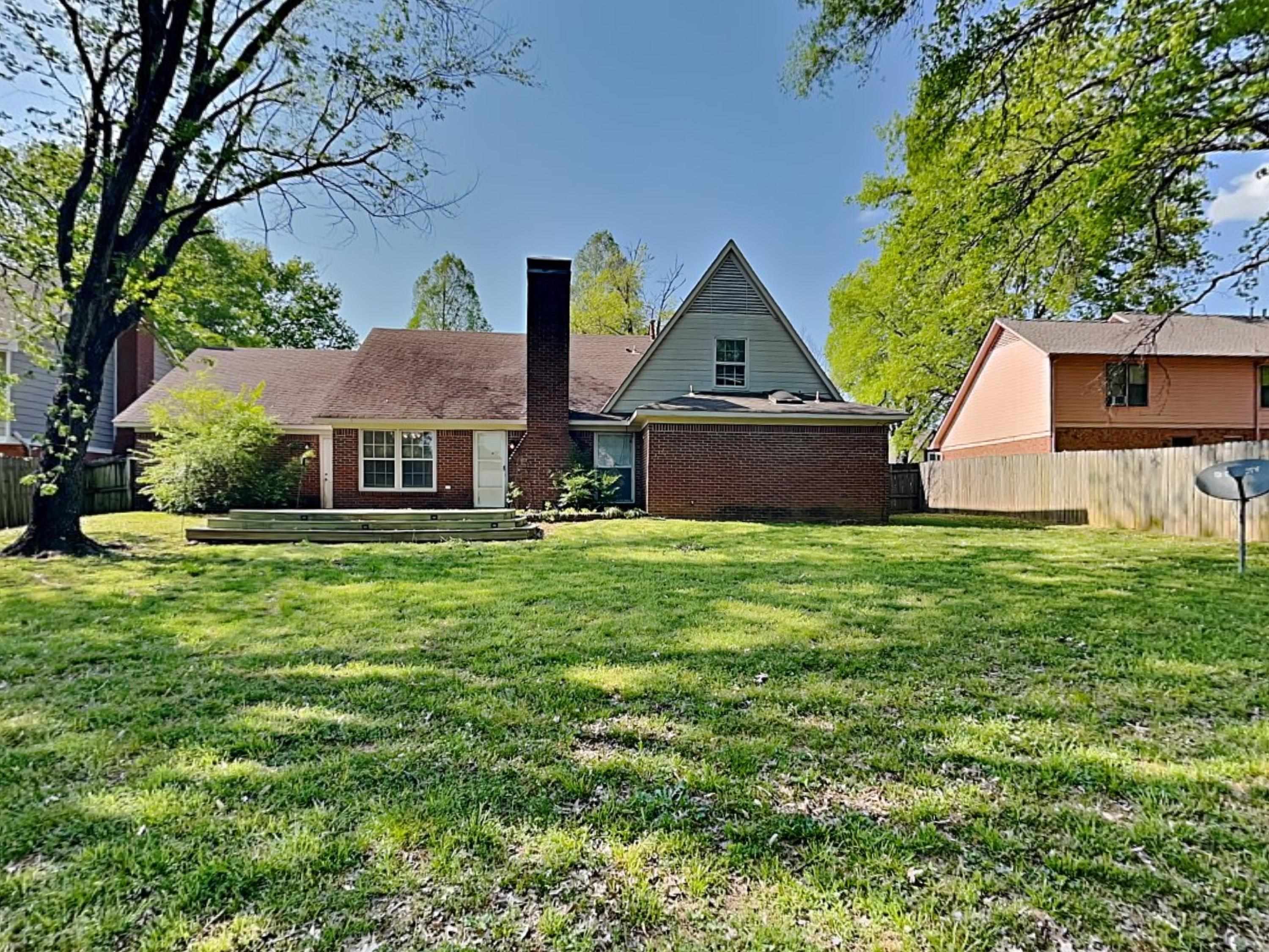 7041 Cutter Mill Road Memphis, TN 38141 - Photo 17 of 18 a front view of house with yard and green space