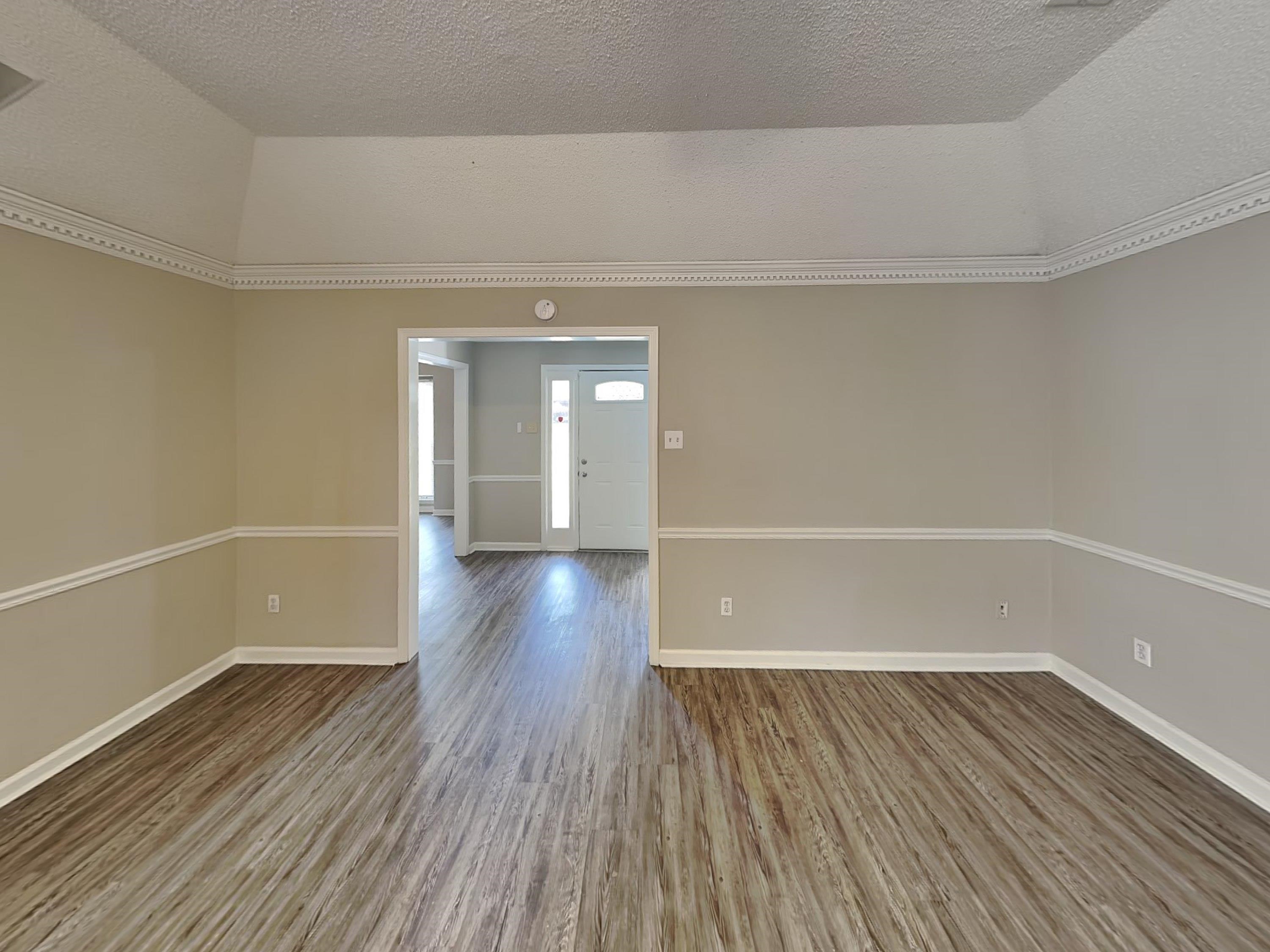 7041 Cutter Mill Road Memphis, TN 38141 - Photo 3 of 18 a view of a room with wooden floors and led lights