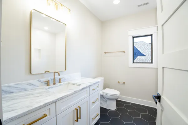 an empty room with fan and a ceiling fan