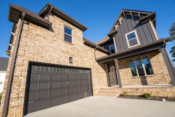 a view of a livingroom with furniture and window