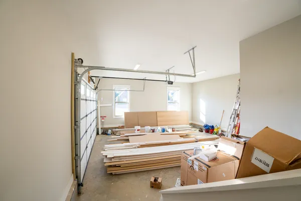 a spacious bedroom with a large bed and a fireplace