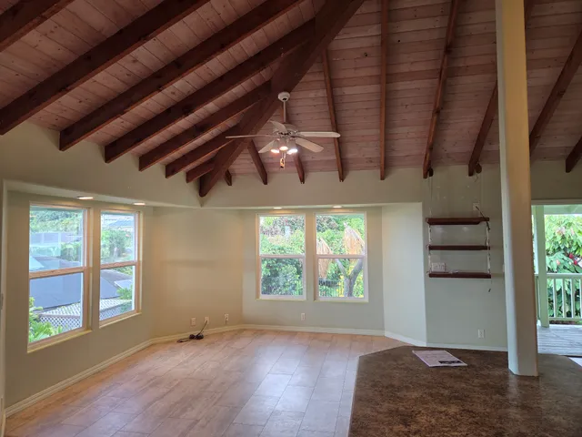 a view of entryway with a window and a carpet