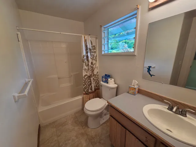 a view of outdoor space with wooden floor