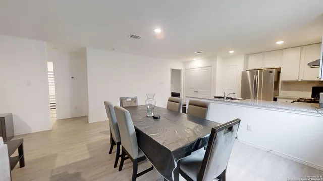 a view of a dining room with furniture