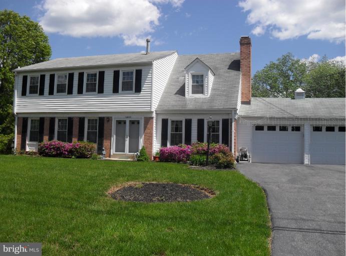 14309 Ansted Road Silver Spring, MD 20905 - Photo 1 of 17 front view of a brick house with a yard