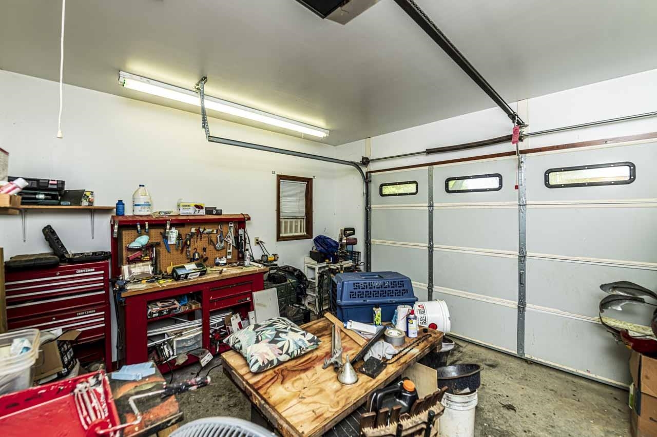 937 Kelleys Chapel Road Burlison, TN 38015 - Photo 37 of 40 Garage featuring a workshop area