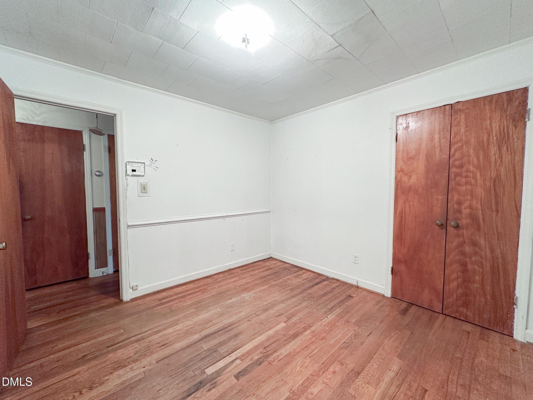 188 Jones Chapel Road Norlina, NC 27563 - Photo 38 of 71 an empty room with wooden floor