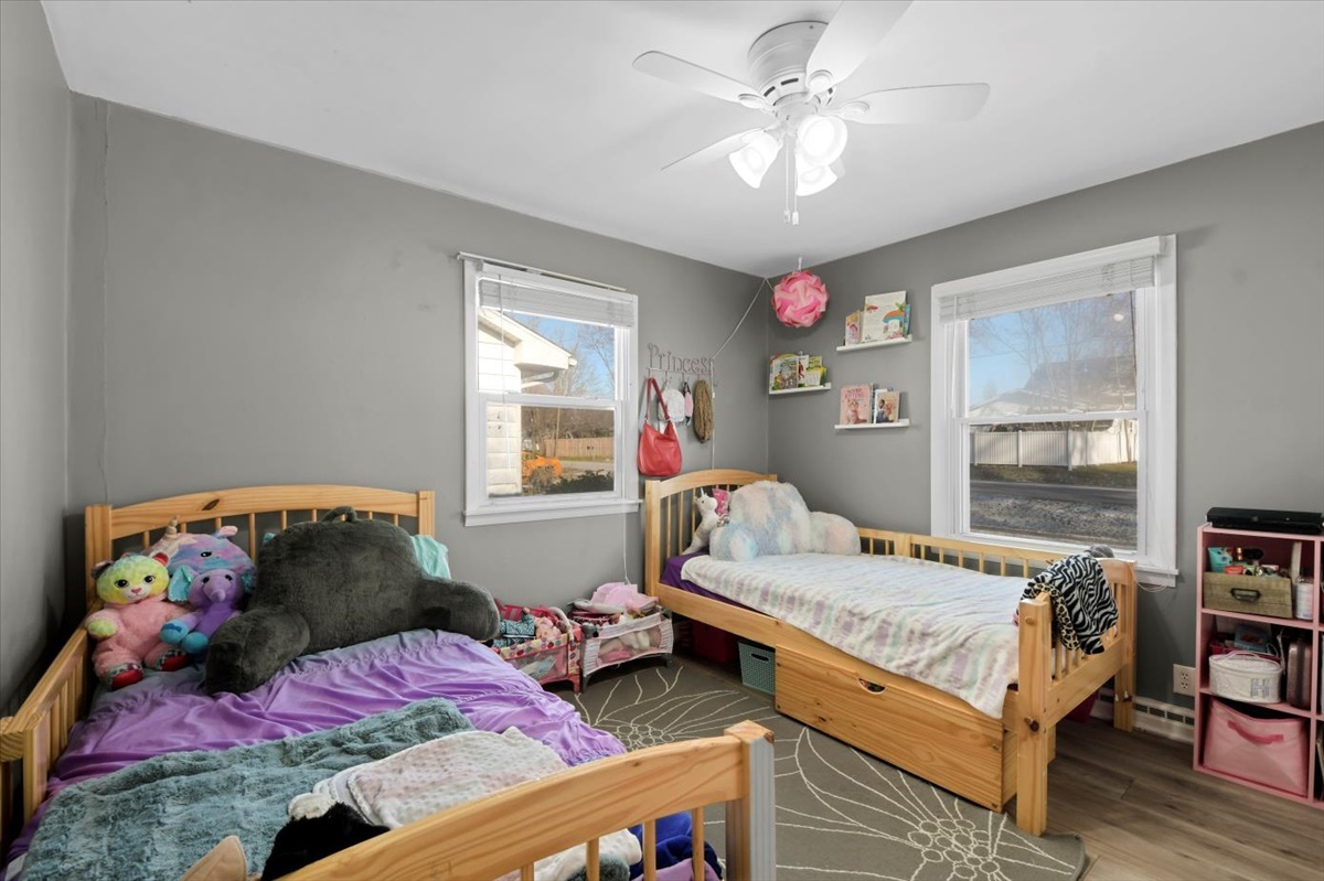 215 North 3rd Street Fisher, IL 61843 - Photo 13 of 17 a bedroom with a bed dresser and a window