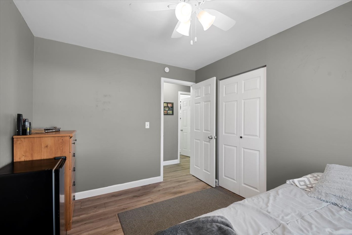 215 North 3rd Street Fisher, IL 61843 - Photo 15 of 17 a bedroom with a bed and a window