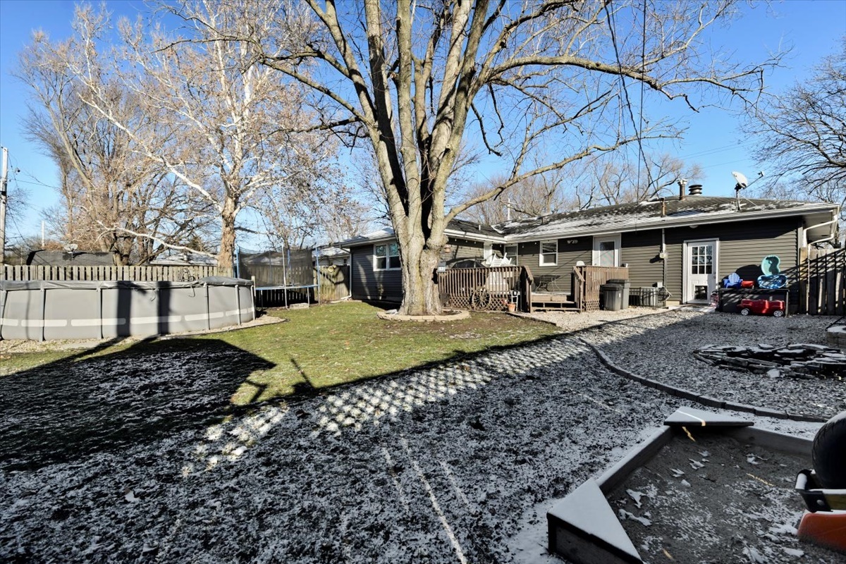 215 North 3rd Street Fisher, IL 61843 - Photo 16 of 17 a view of a house with backyard and sitting area