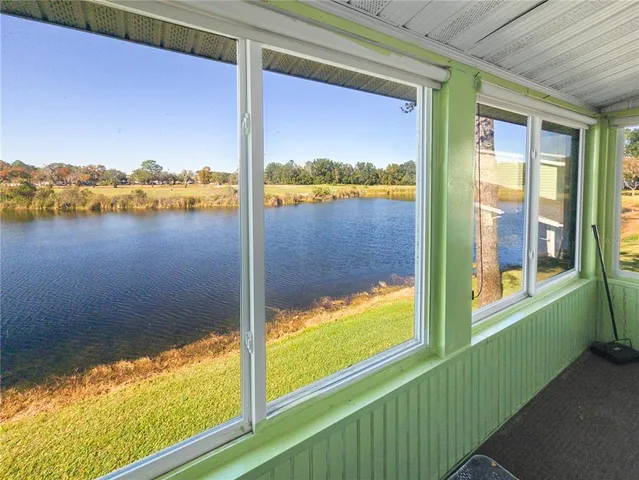 a view of a balcony with lake view