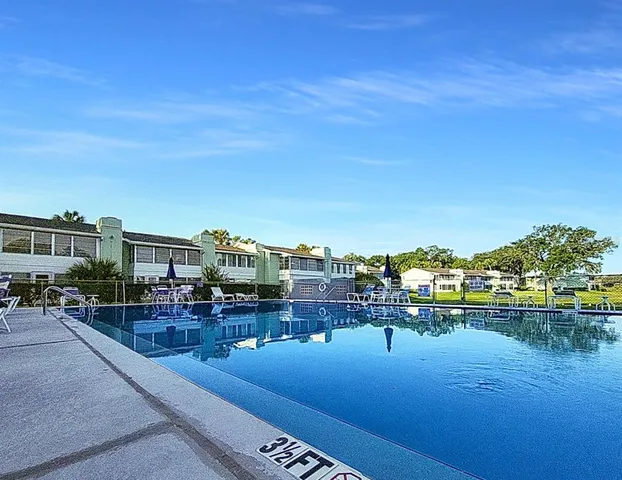 a view of a lake with a yard