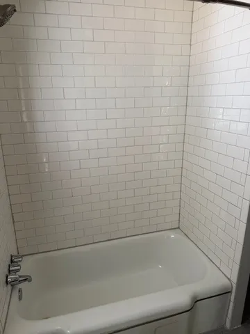 a bathroom with a bathtub