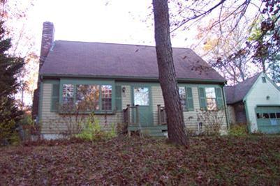 108 Ebenezer Road Osterville, MA 02655 - Photo 16 of 17 a front view of a house with garden
