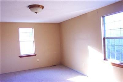 108 Ebenezer Road Osterville, MA 02655 - Photo 9 of 17 an empty room with a window