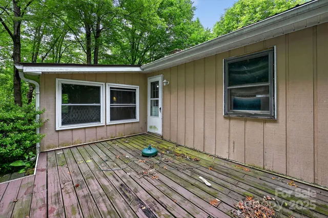 a house with trees in the background