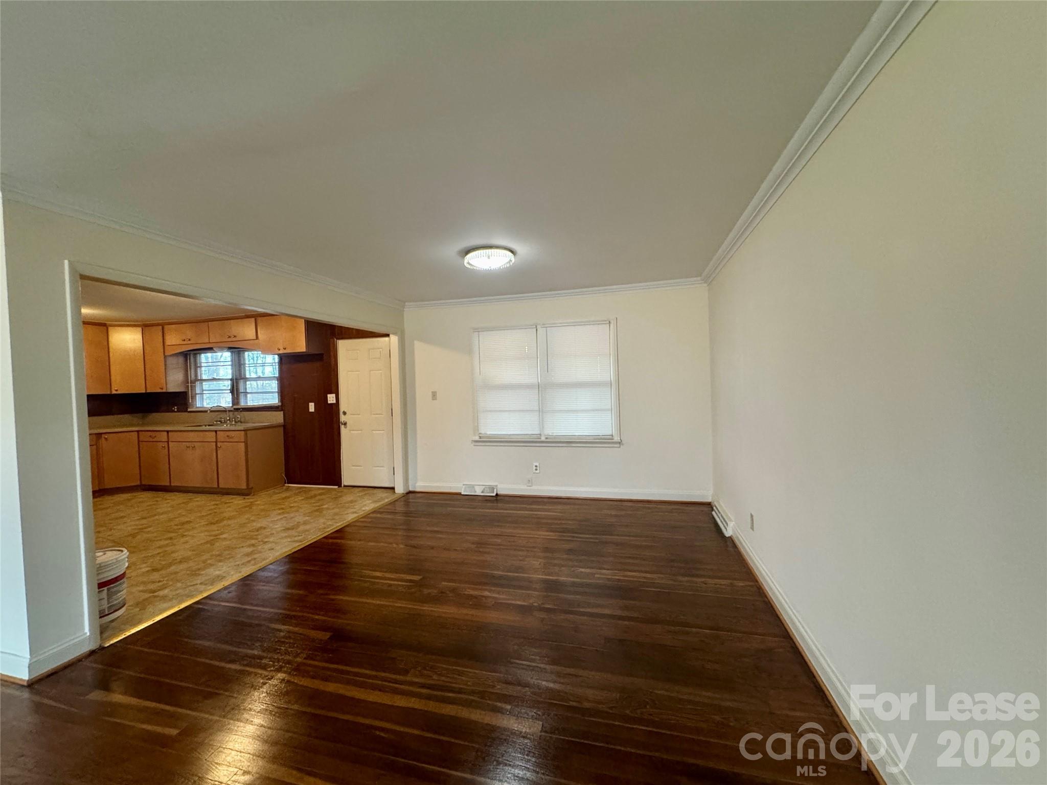 102 Ridge Drive Stanley, NC 28164 - Photo 4 of 18 a view of empty room with wooden floor
