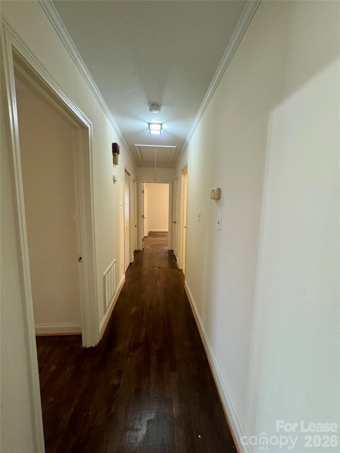102 Ridge Drive Stanley, NC 28164 - Photo 7 of 18 a view of a hallway with the wooden floor