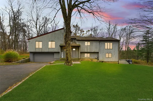 a house view with a garden space