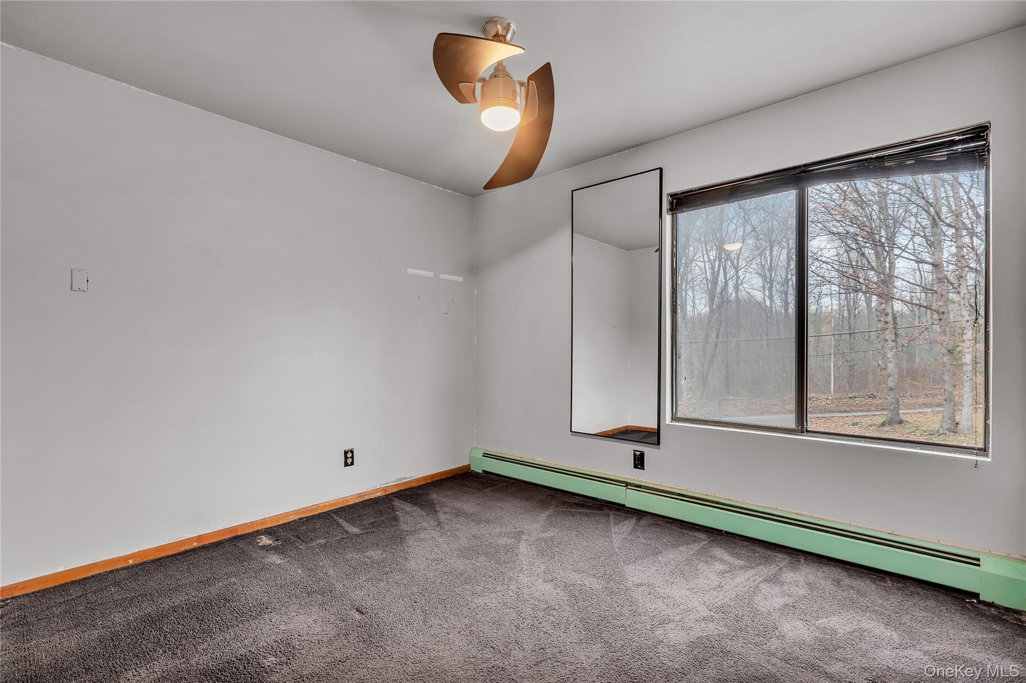 1845 Jacob Road Cortlandt Manor, NY 10567 - Photo 21 of 38 a view of an empty room with a window