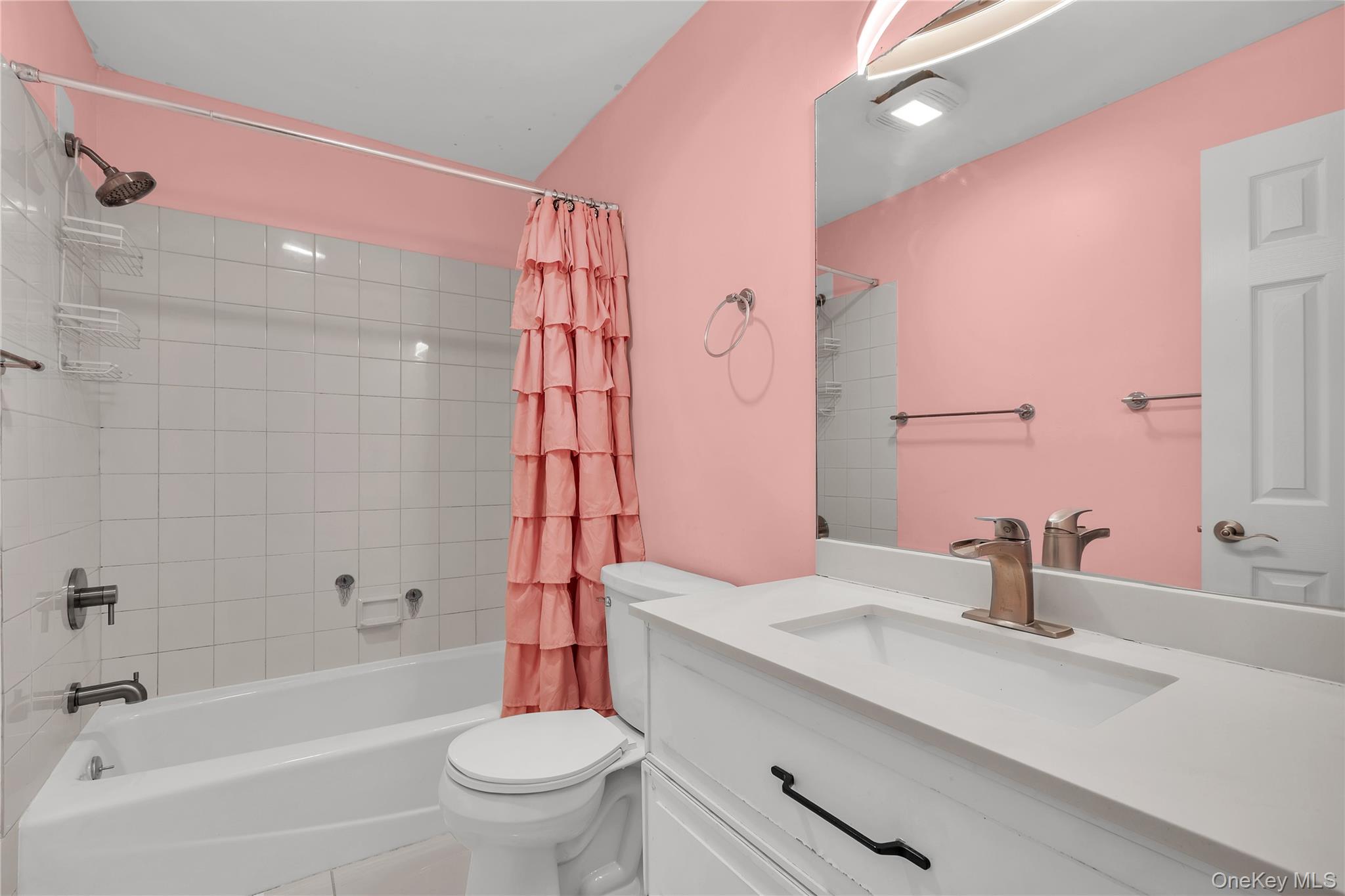 1845 Jacob Road Cortlandt Manor, NY 10567 - Photo 22 of 38 a bathroom with a sink a toilet and shower