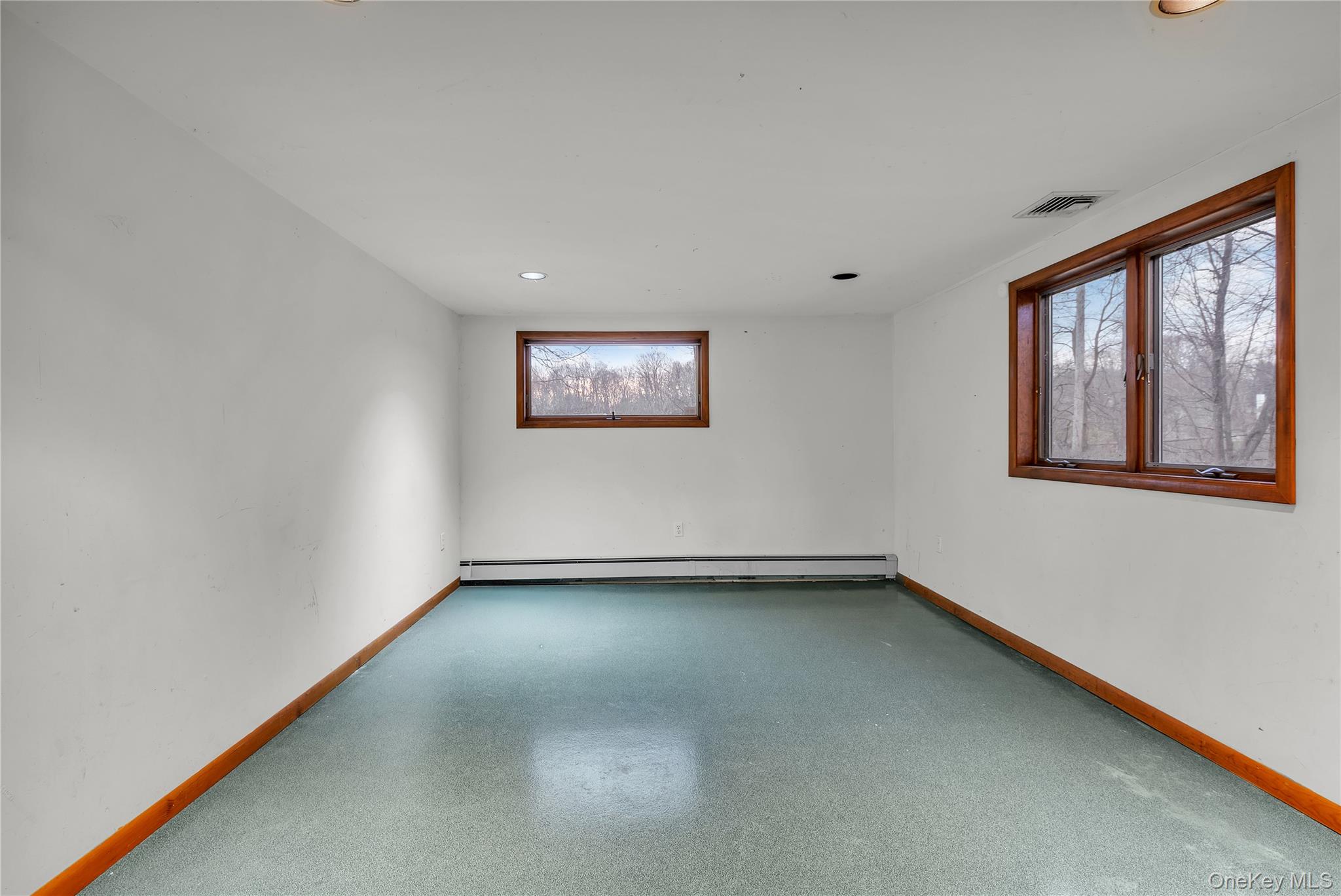 1845 Jacob Road Cortlandt Manor, NY 10567 - Photo 29 of 38 a view of an empty room with a window