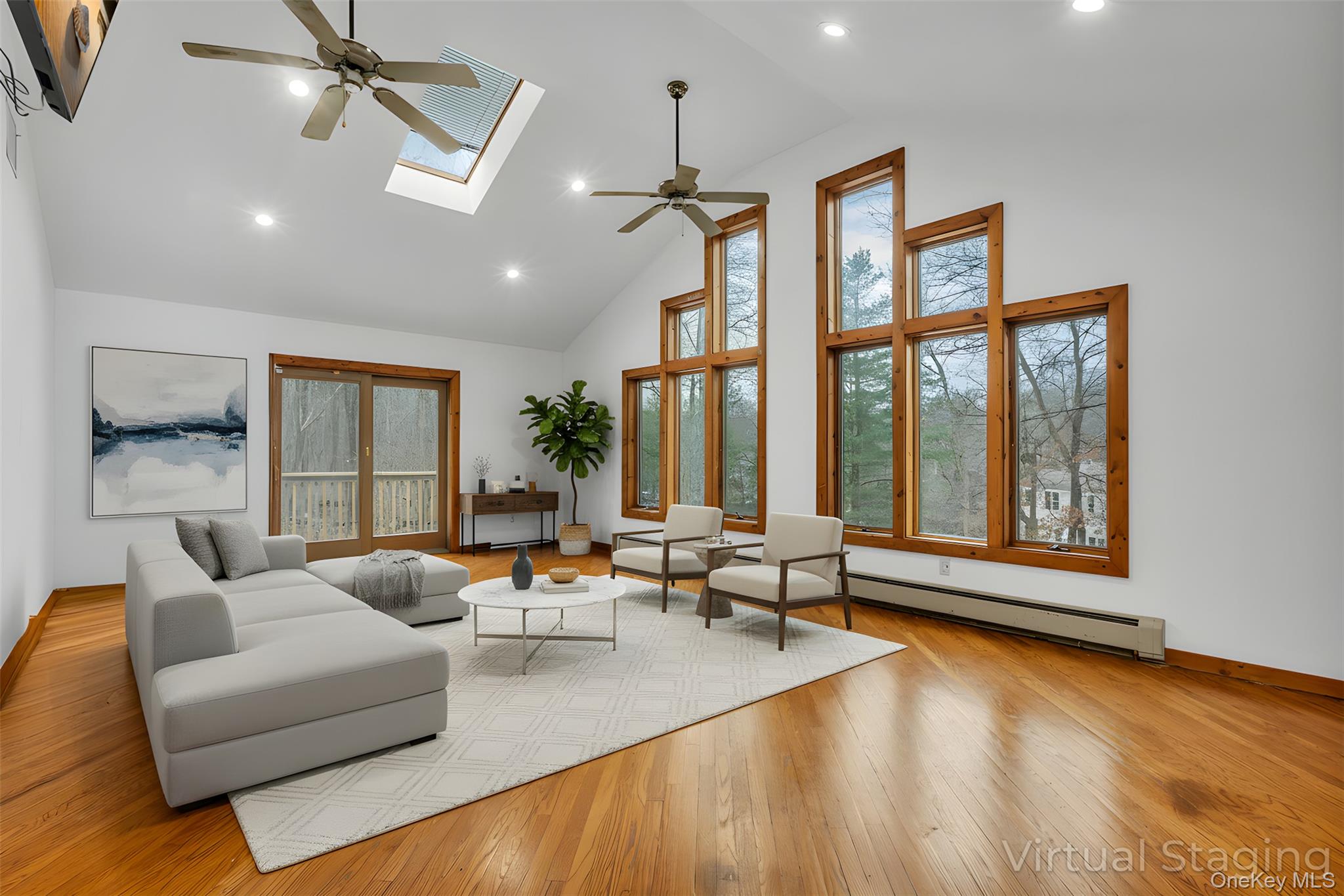 1845 Jacob Road Cortlandt Manor, NY 10567 - Photo 9 of 38 a living room with furniture and floor to ceiling windows