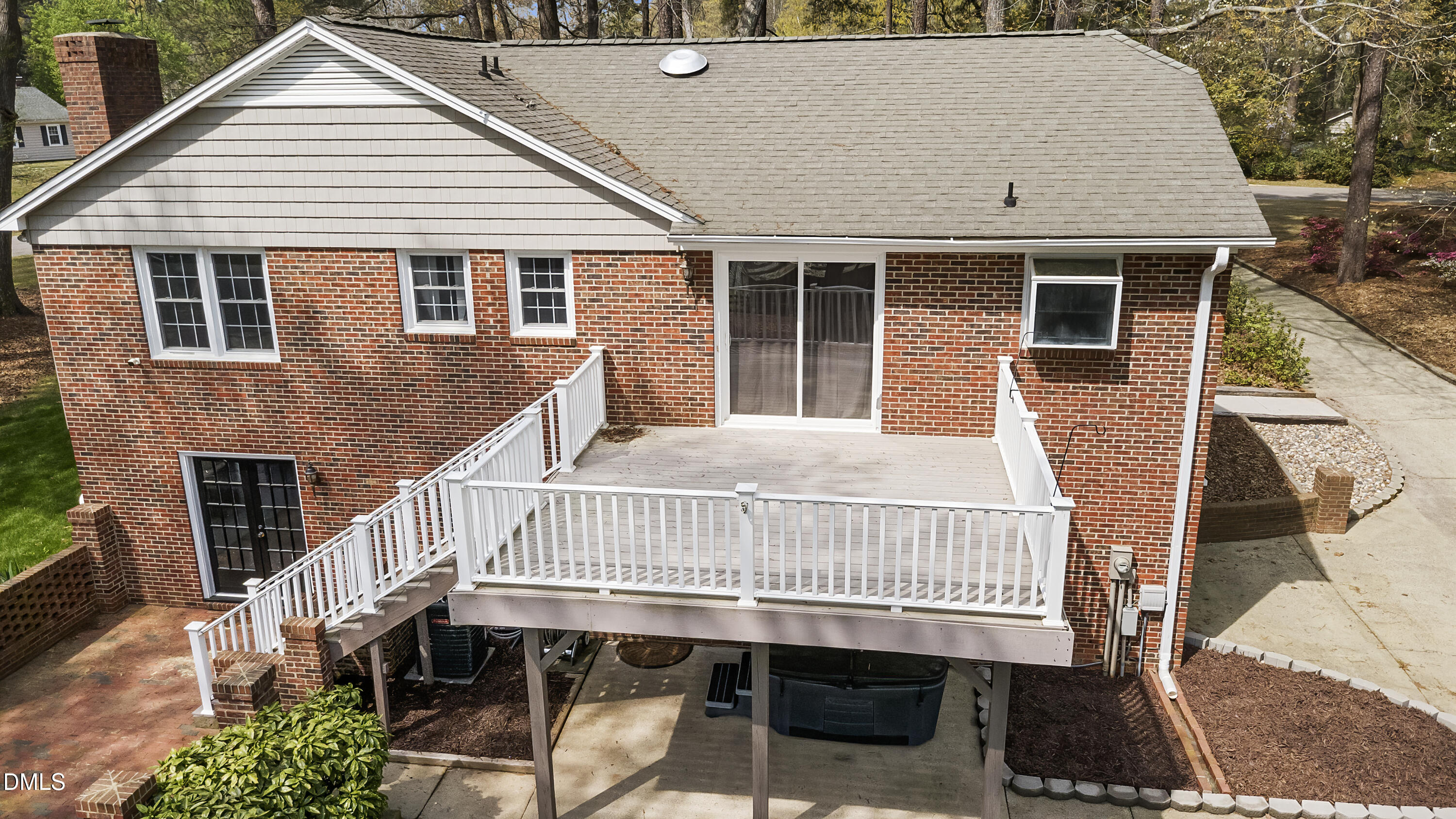 1821 Owls Nest Road Sanford, NC 27330 - Photo 14 of 77 a view of a house with a wooden deck and furniture