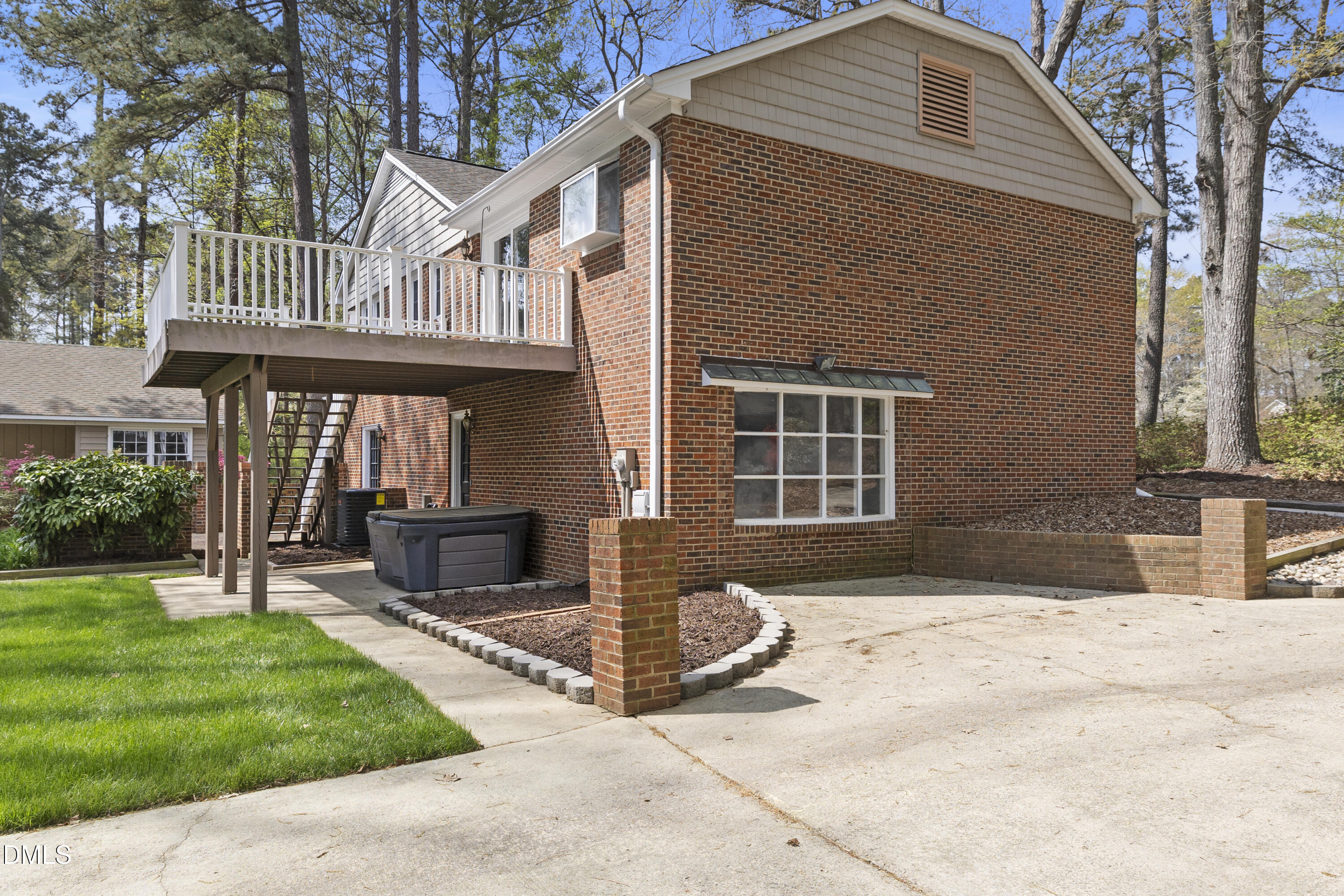 1821 Owls Nest Road Sanford, NC 27330 - Photo 18 of 77 a front view of a house with a yard outdoor seating and garage