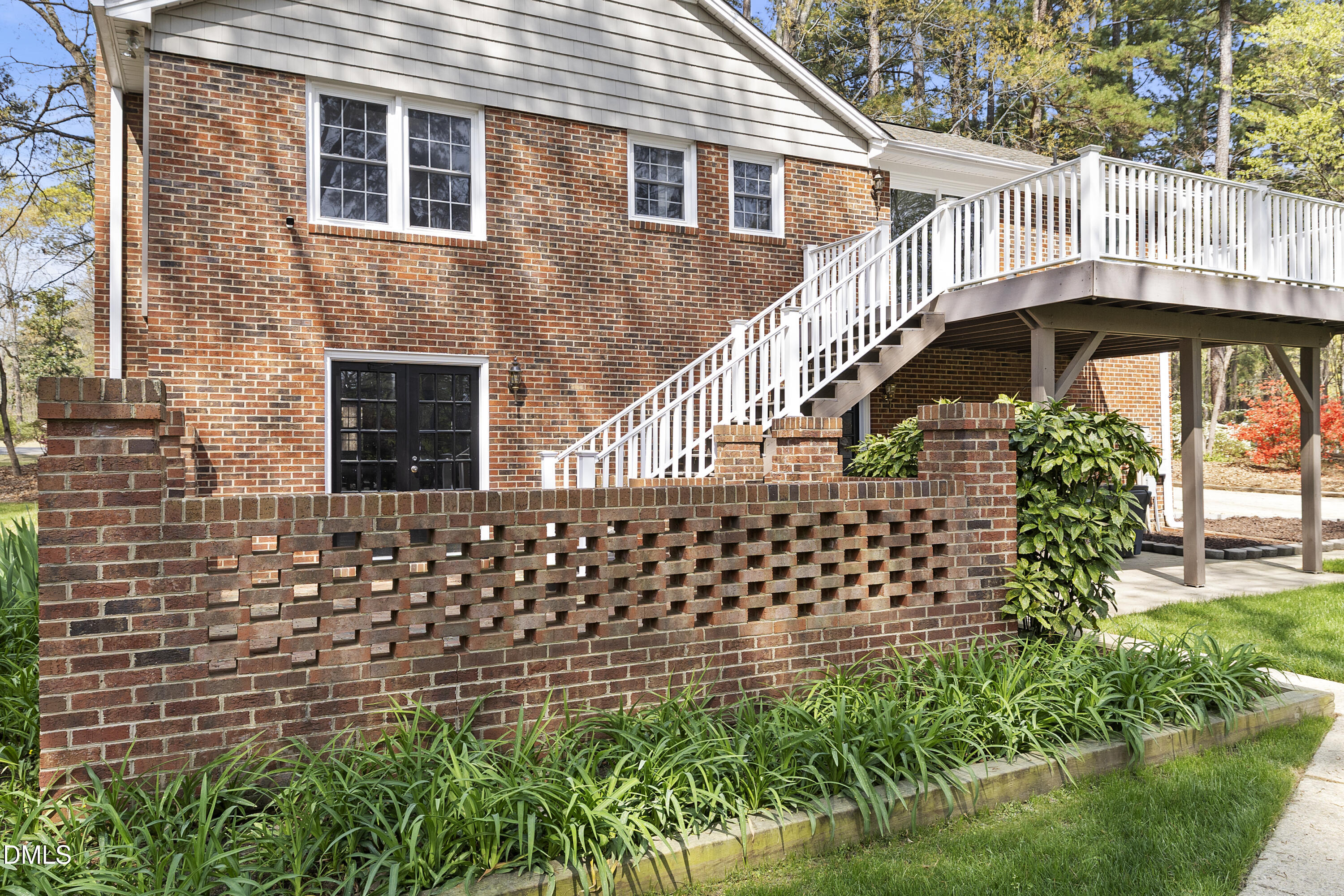 1821 Owls Nest Road Sanford, NC 27330 - Photo 20 of 77 a front view of a house with plants