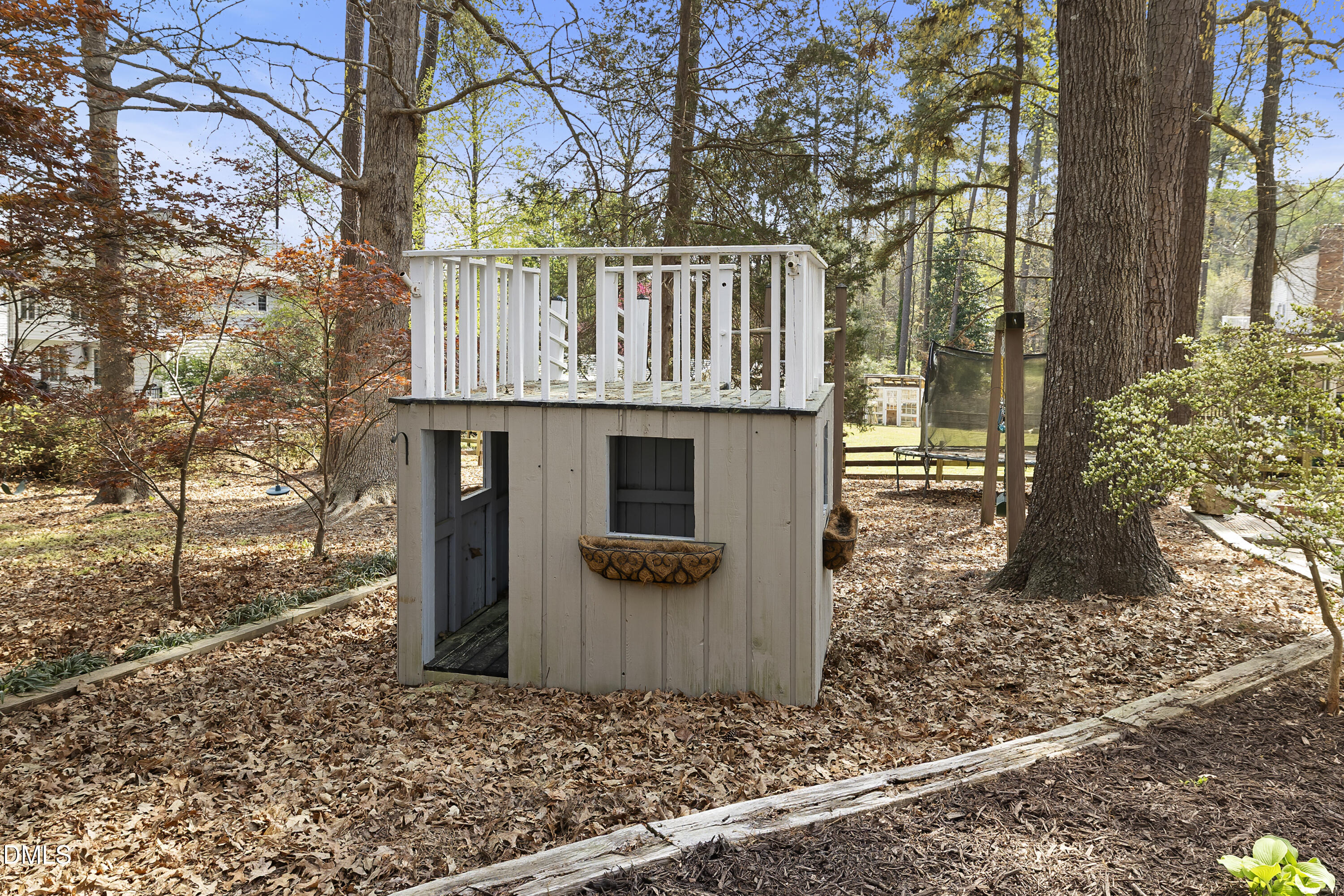 1821 Owls Nest Road Sanford, NC 27330 - Photo 22 of 77 a view of a house with a yard and large tree