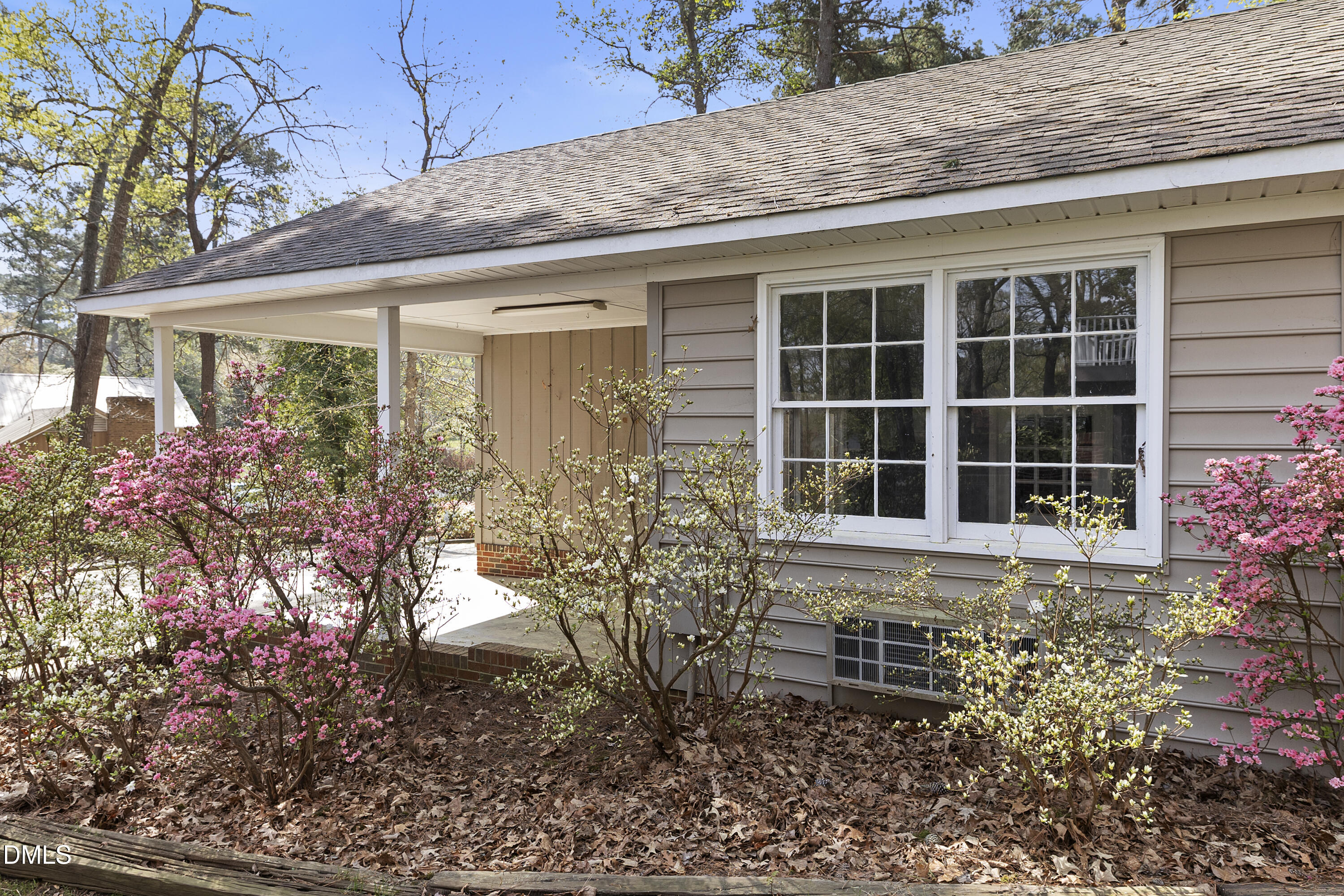 1821 Owls Nest Road Sanford, NC 27330 - Photo 32 of 77 a front view of a house with a garden