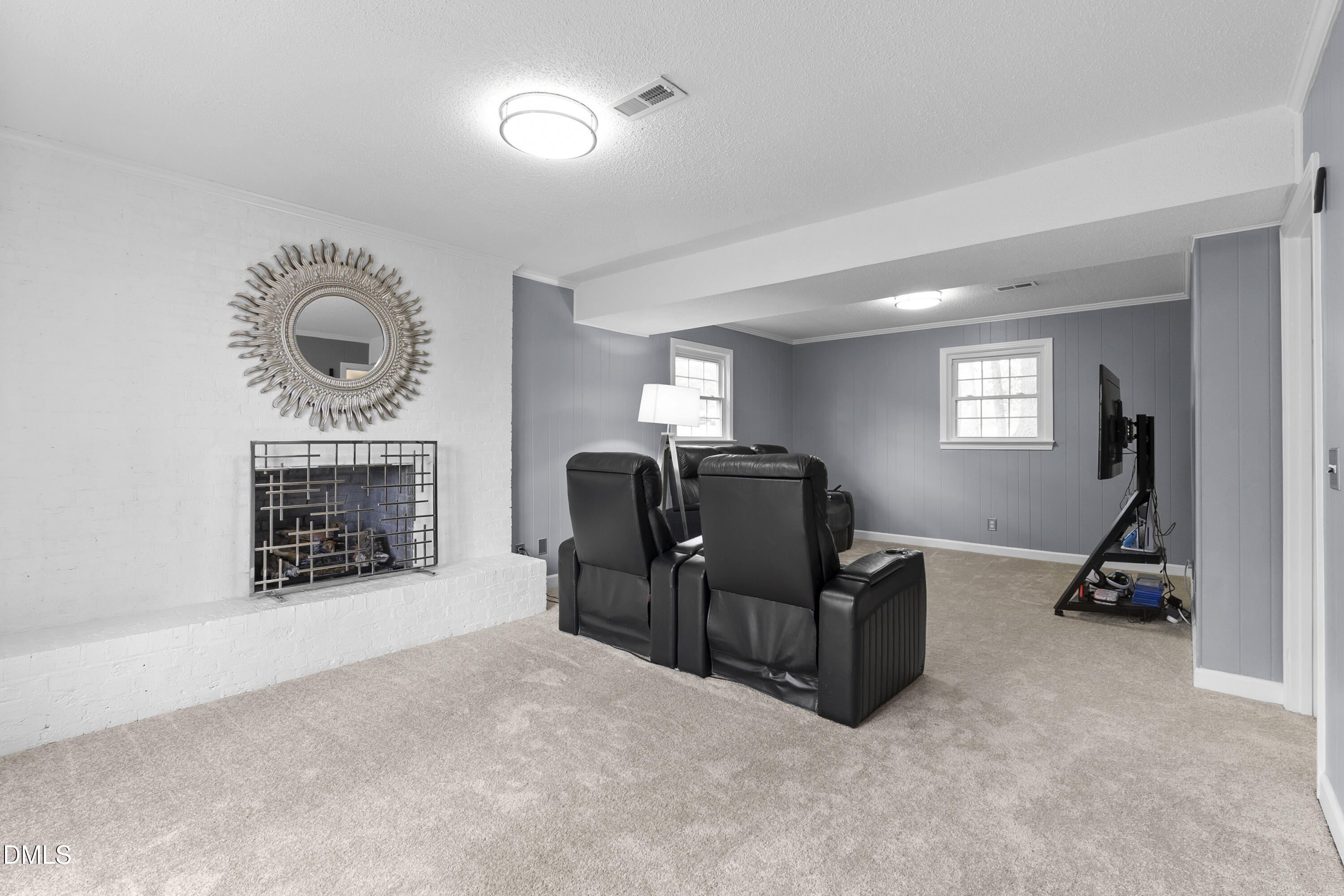 1821 Owls Nest Road Sanford, NC 27330 - Photo 35 of 77 a view of a livingroom with furniture and a flat screen tv