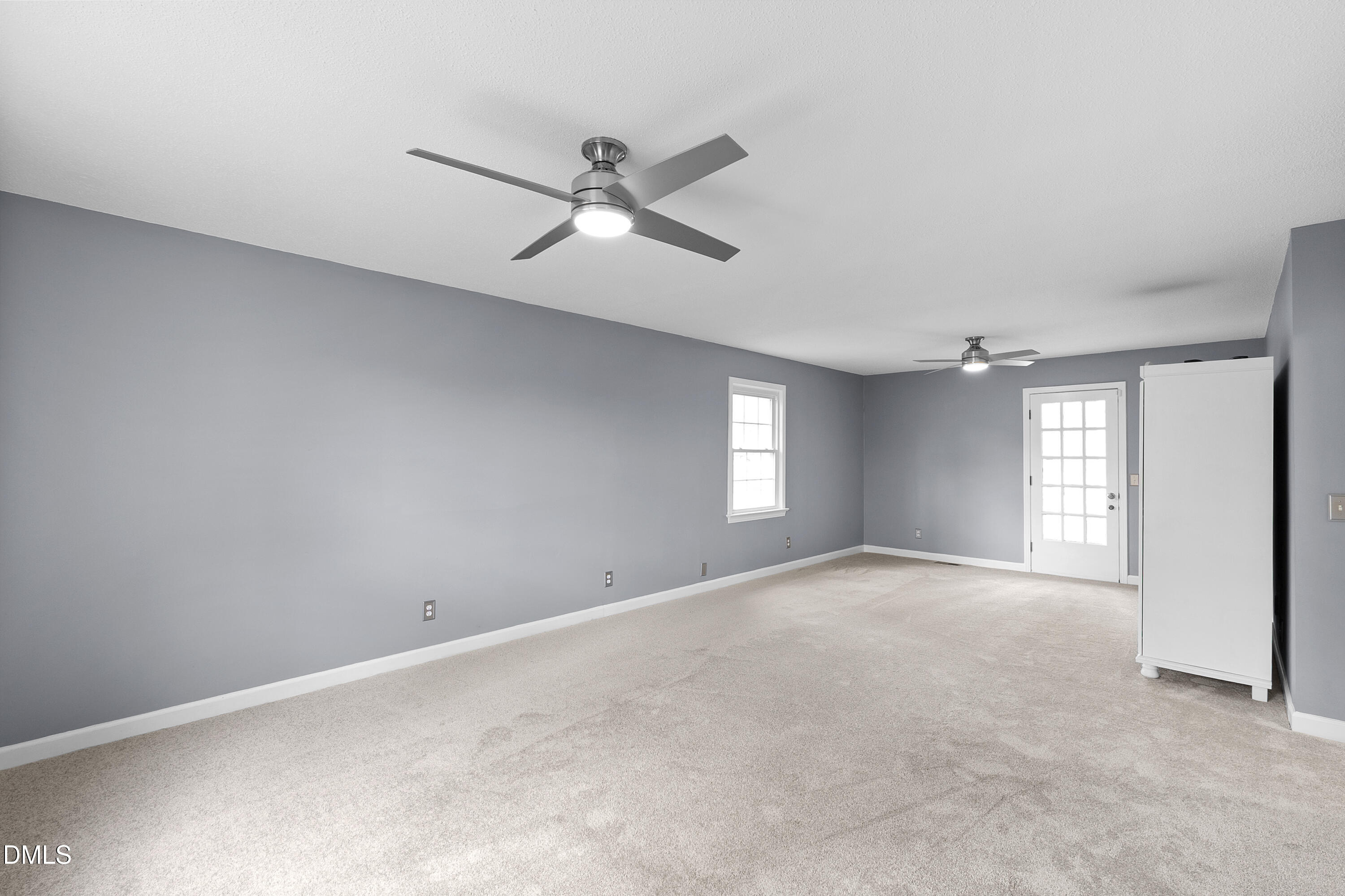 1821 Owls Nest Road Sanford, NC 27330 - Photo 50 of 77 a view of a livingroom with a ceiling fan and window