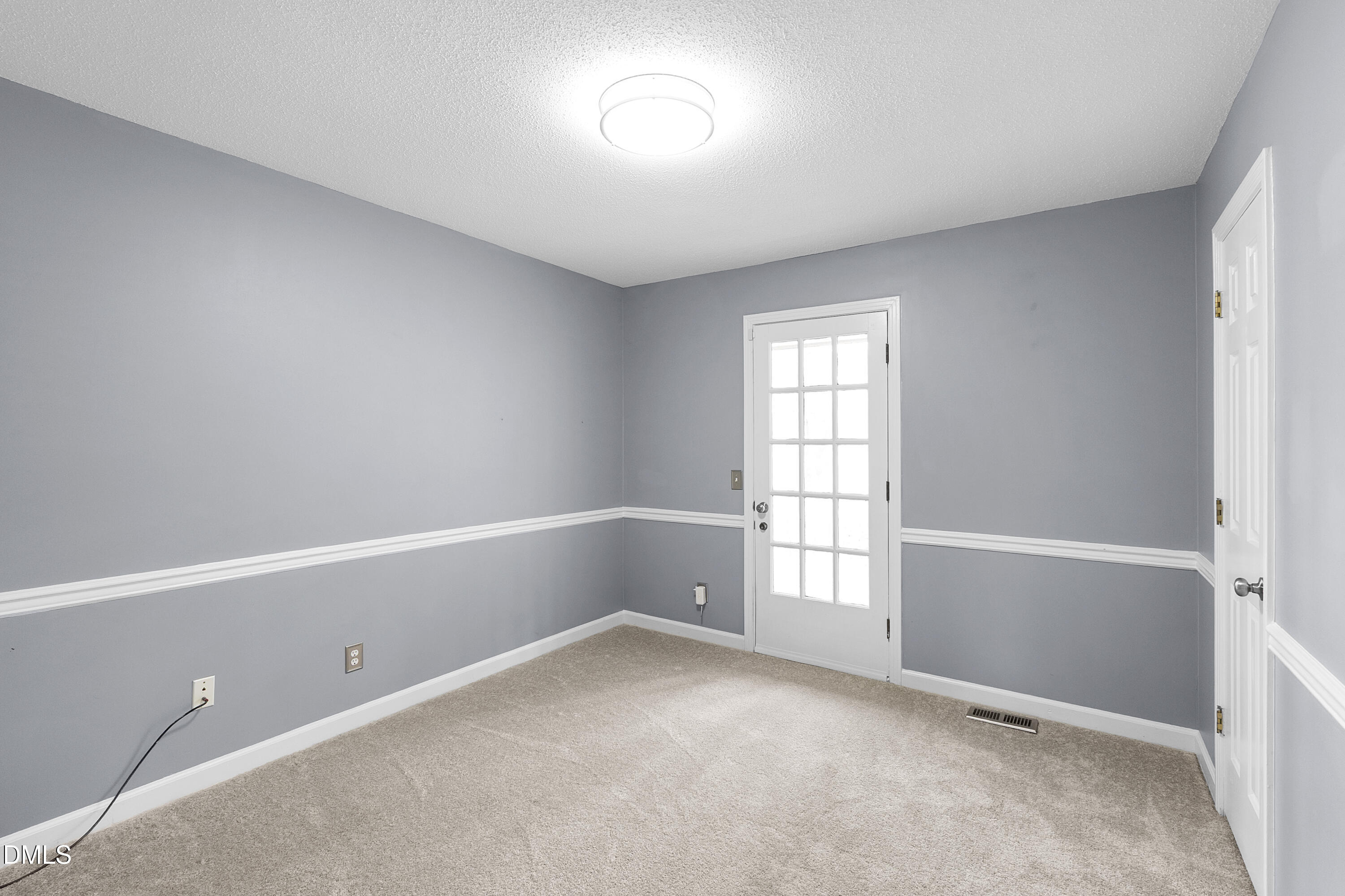 1821 Owls Nest Road Sanford, NC 27330 - Photo 54 of 77 an empty room with windows