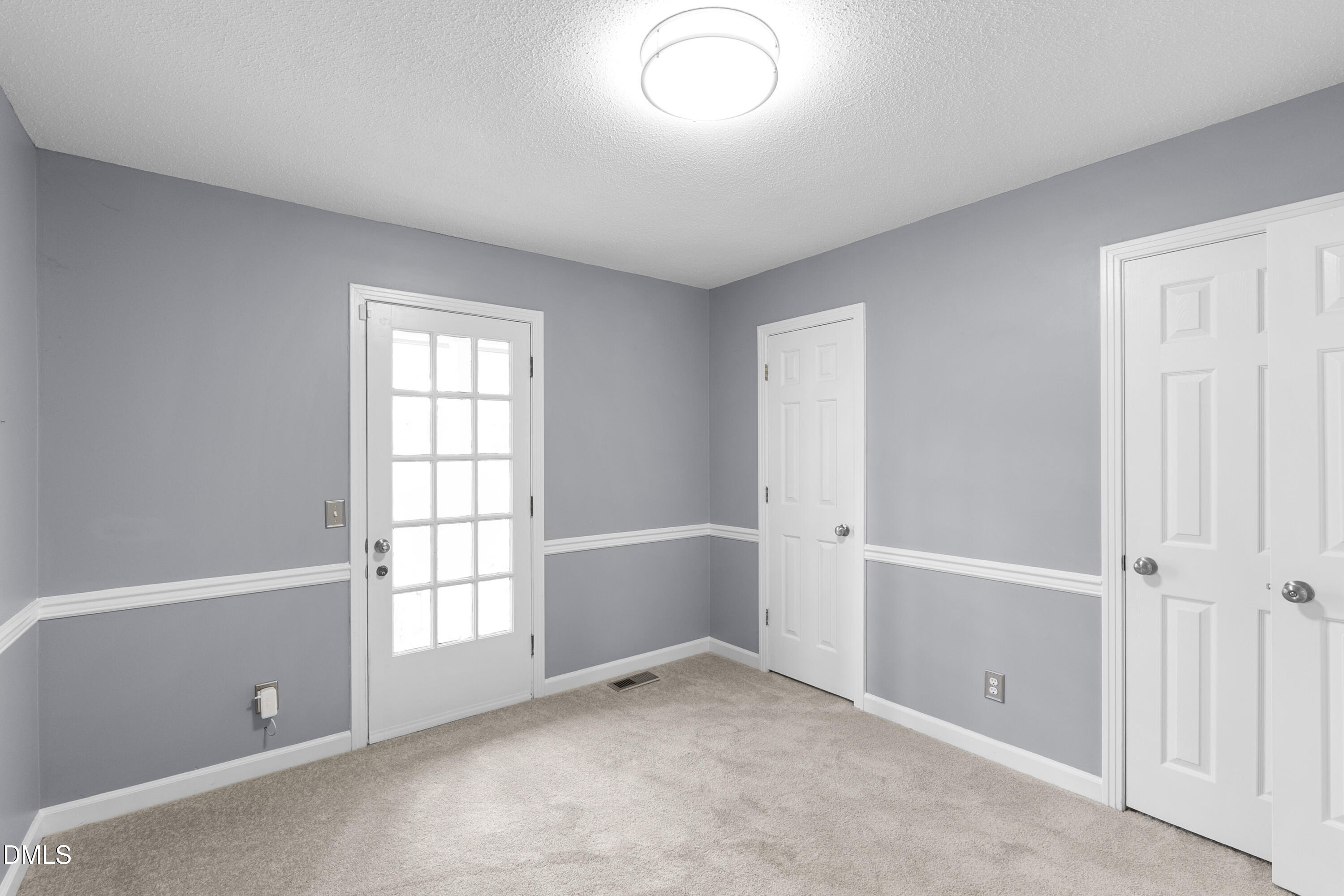 1821 Owls Nest Road Sanford, NC 27330 - Photo 55 of 77 an empty room with windows