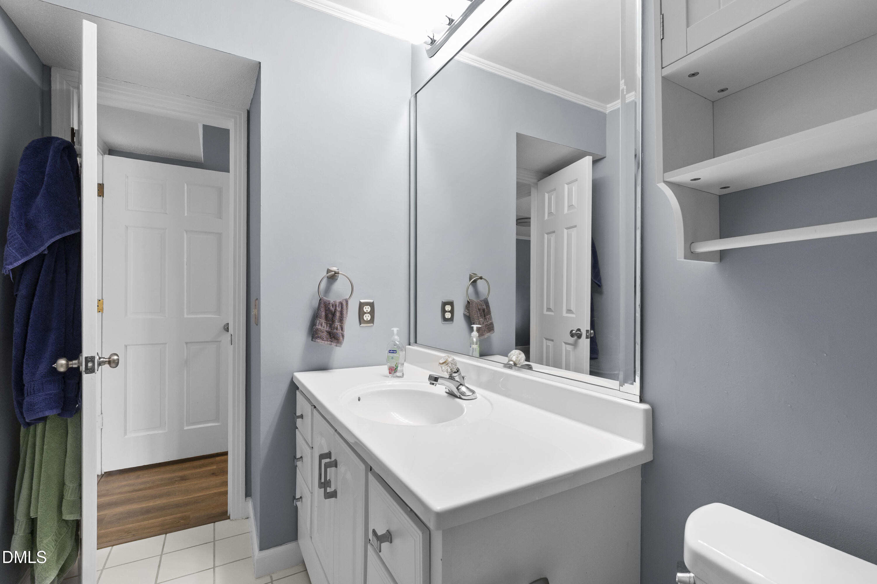 1821 Owls Nest Road Sanford, NC 27330 - Photo 71 of 77 a bathroom with a sink and a mirror