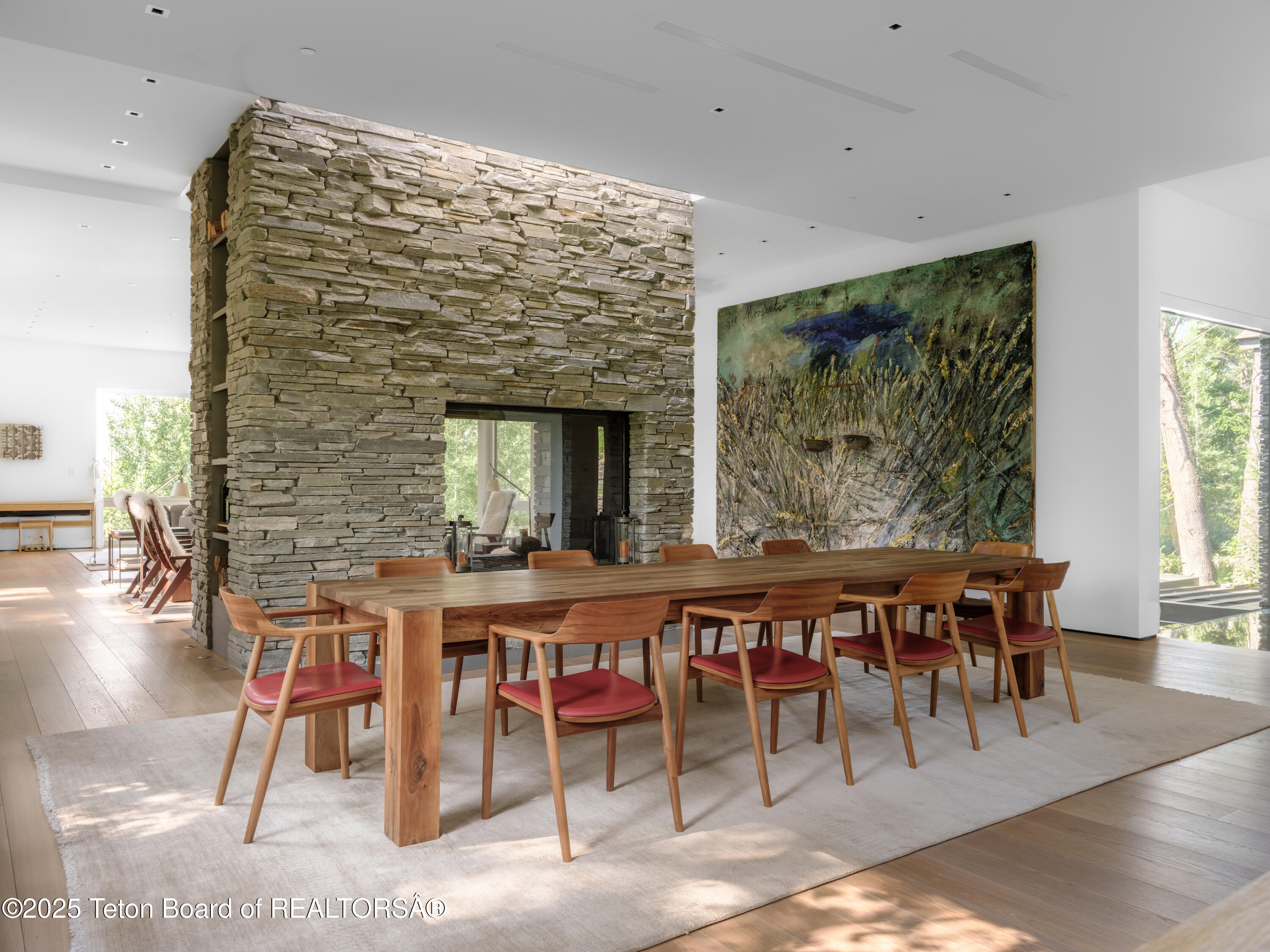 7970 North Granite Ridge Road Teton Village, WY 83025 - Photo 11 of 41 Double sided stone fireplace