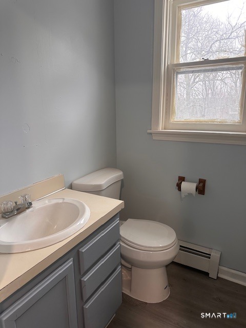 259 Westchester Road, Unit A Colchester, CT 06415 - Photo 17 of 24 a bathroom with a toilet sink and window