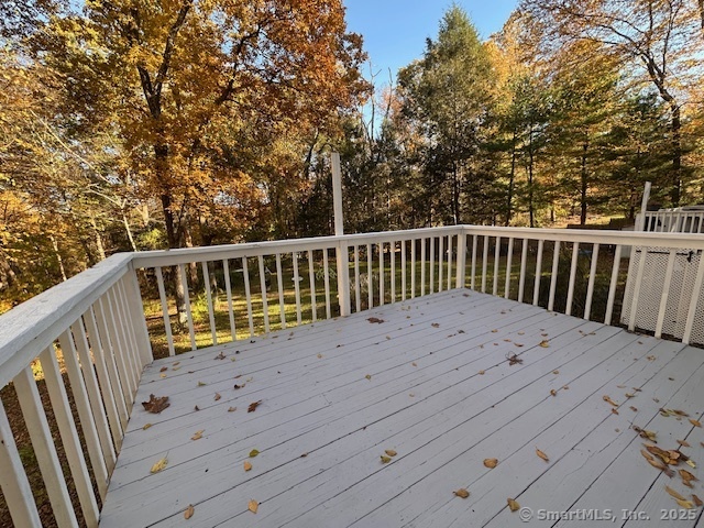 259 Westchester Road, Unit A Colchester, CT 06415 - Photo 20 of 24 a view of balcony with wooden fence