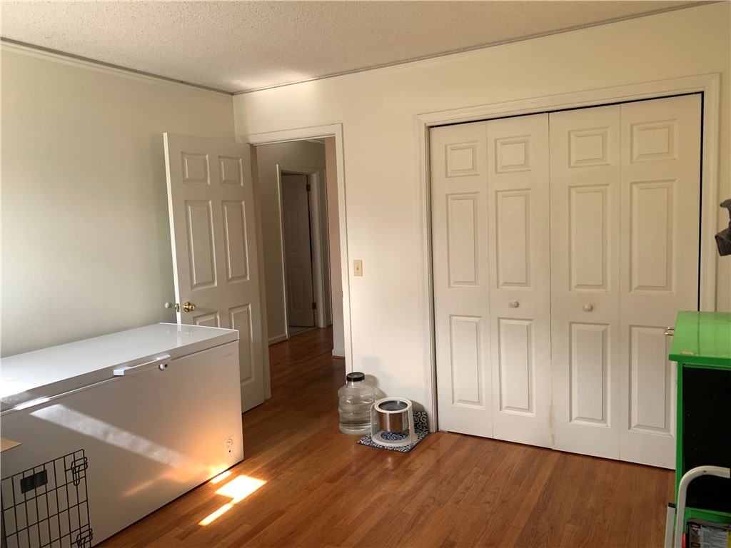 224 Polaris Street Anderson, SC 29621 - Photo 16 of 30 Bedroom featuring hardwood floors and ample closet space.