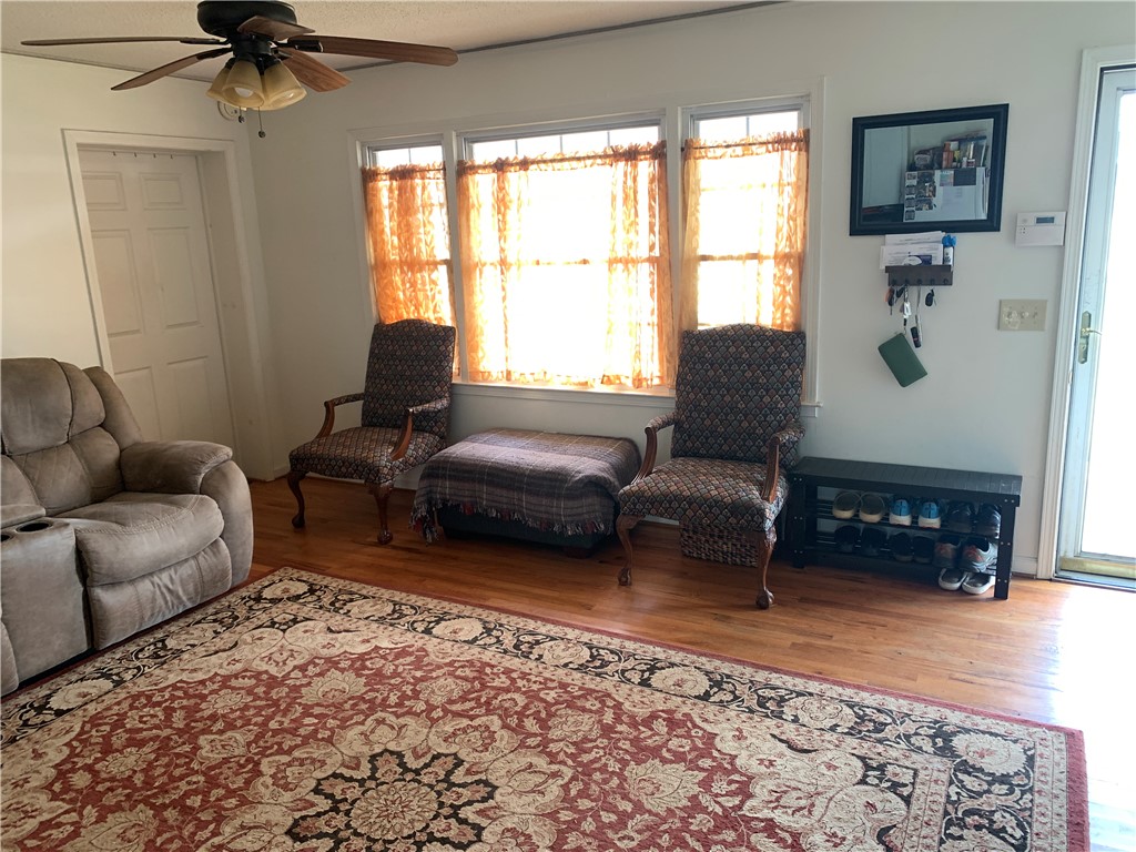 224 Polaris Street Anderson, SC 29621 - Photo 3 of 30 This living space features hardwood floors and abundant natural light.