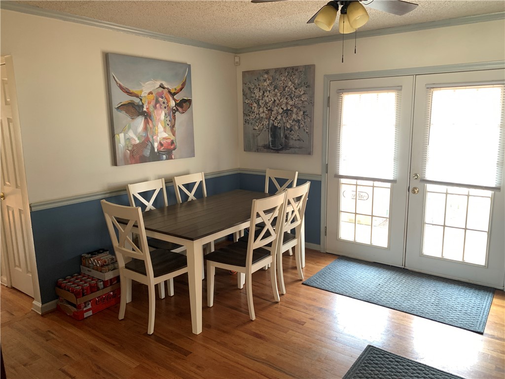 224 Polaris Street Anderson, SC 29621 - Photo 5 of 30 This inviting dining area features convenient French doors leading to the deck.