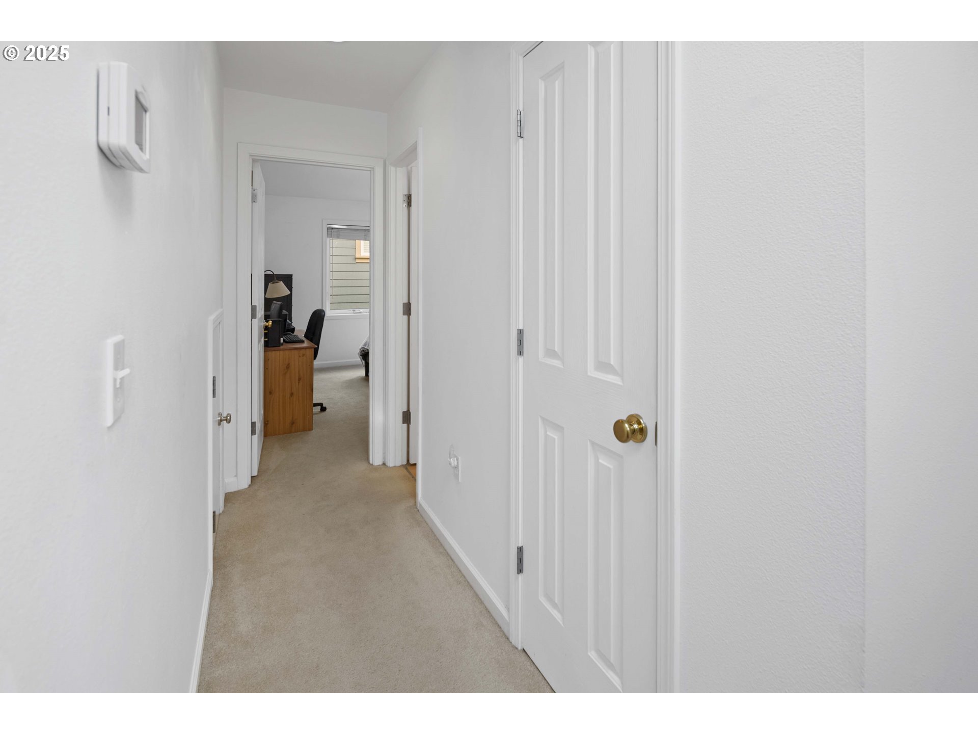 265 23rd Street Astoria, OR 97103 - Photo 19 of 36 a view of a hallway with two rooms