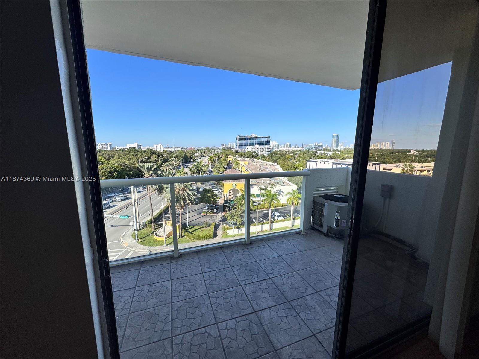 13499 Biscayne Boulevard, Unit 703 North Miami, FL 33181 - Photo 20 of 22 a view of a balcony and a mountain view from a window