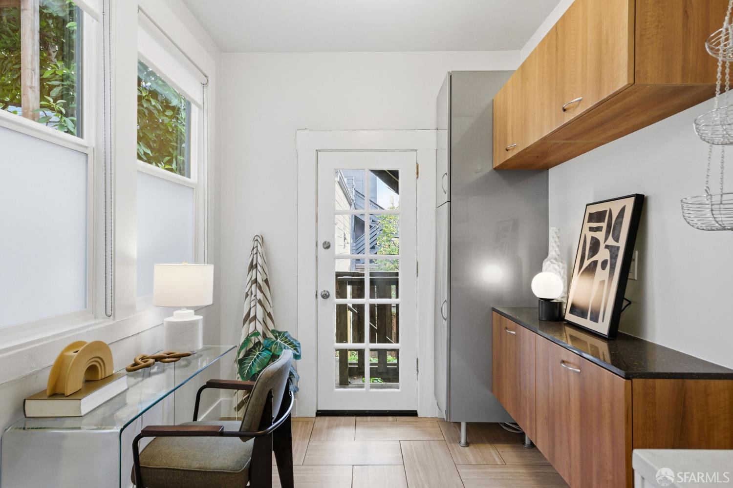 3452 18th Street, Unit A San Francisco, CA 94110 - Photo 13 of 39 a view of a hallway to a livingroom with furniture