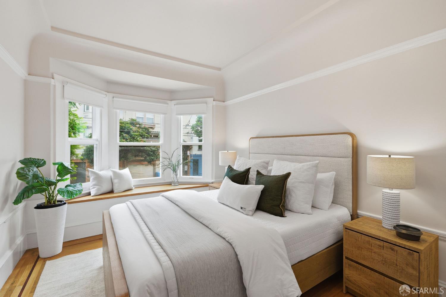 3452 18th Street, Unit A San Francisco, CA 94110 - Photo 20 of 39 a bedroom with a bed and a window